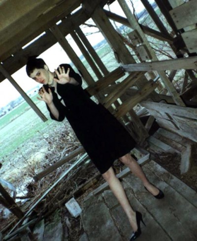 This picture of 14-year-old Regina Kay Walters was taken by serial killer Robert Ben Rhoades, who toured the country in an 18-wheeler equipped with a torture chamber in the back. This photo was taken in an abandoned Illinois barn, where Rhoades killed Walters after cutting off her hair and making her wear a black dress and heels.