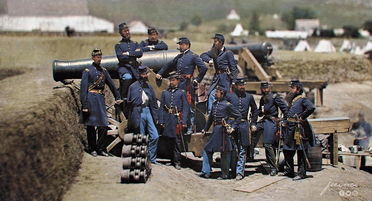 US Civil War – Officers of the 69th New York Volunteer Regiment pose with a cannon at Fort Corcoran in 1861