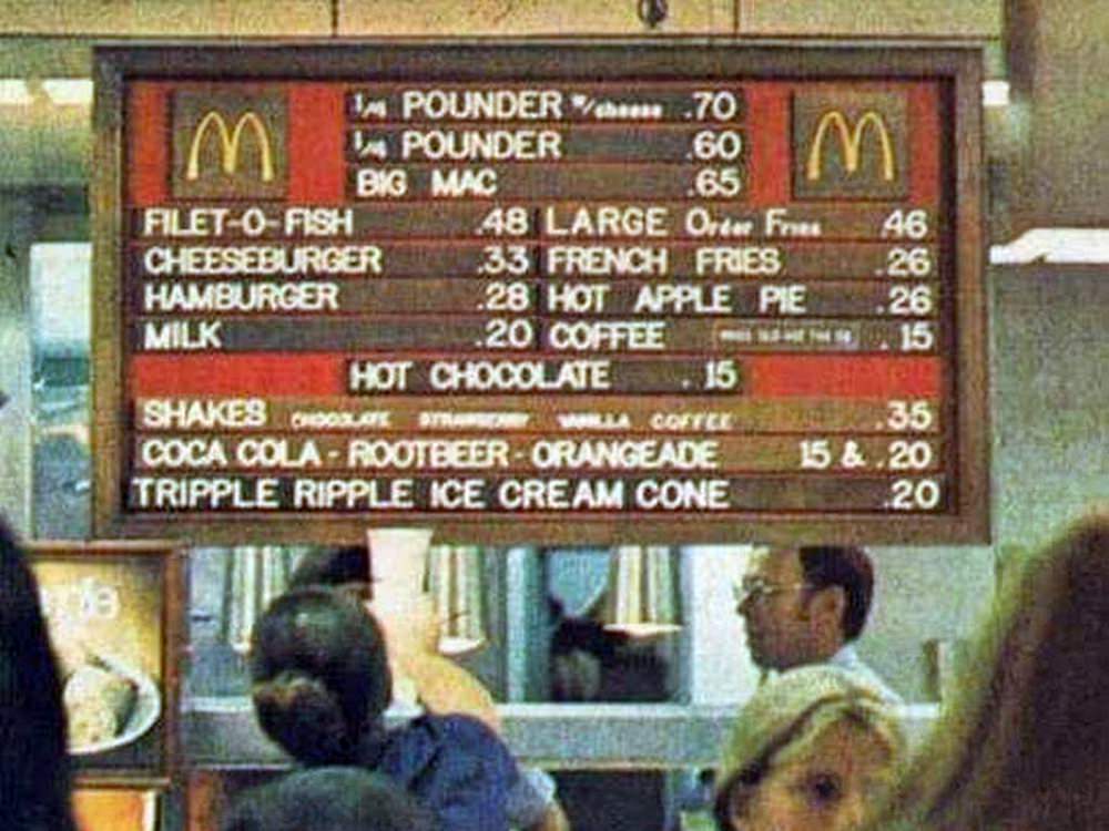 mcdonalds 1973 - 70 1 Pounder som Pounder Big Mac FiletOFishes 48 Large Order Fr Cheeseburgerse.33 French Fries Hamburger 228 Hot Apple Pie Milk 5.20 Coffee Hot Chocolate 15 Shakes coors A Coste Coca Cola Rootbeer Orangeade Tripple Ripple Ice Cream Cone