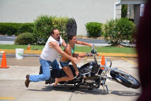 two guys on a motorcycle
