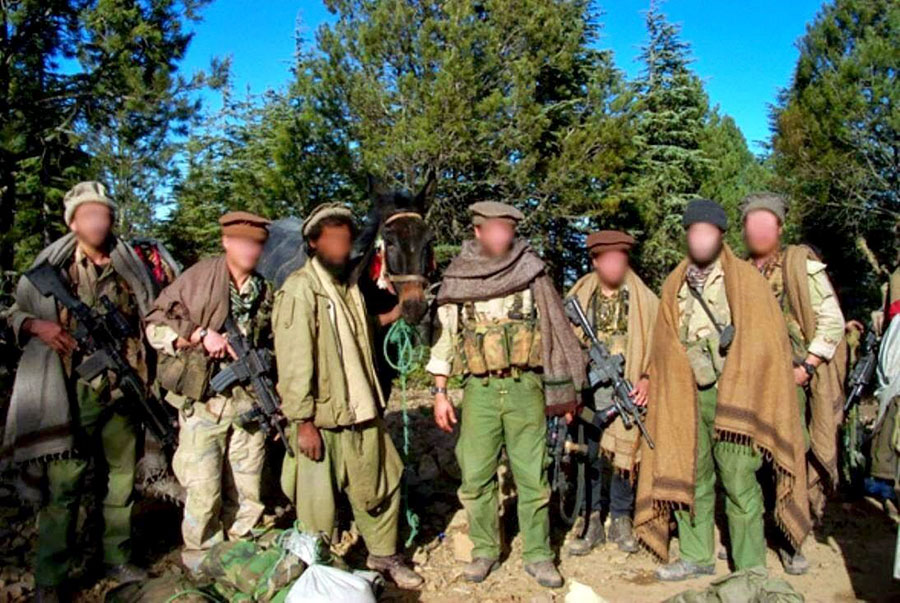 1st SFOD-Delta operators dressed as Afghan civilians in Tora Bora, 2001