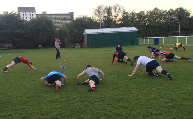 I was at rugby practice and we were doing stretches and we were all lying on the ground and my friend has his head positioned​ close to my other friends crotch. My friend says quite loudly "it looks like you're about to suck my dick" when he realised that our coach (who is also a teacher at out school) heard him he started to apologize for swearing when our coach says "he wants a meal not a snack"