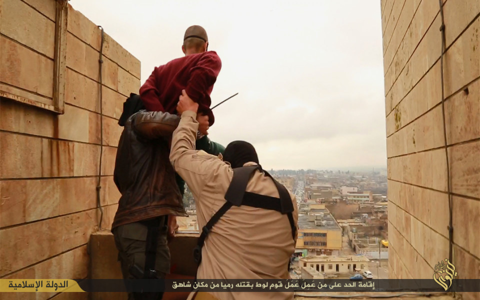 ISIS throw a gay man off building to his death