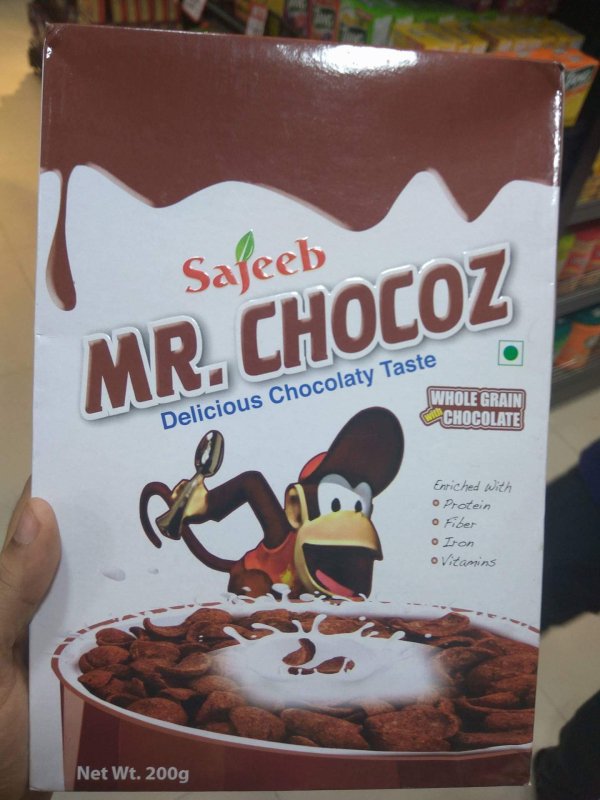 crappy knockoffs - Sajeeb Mr. Chocoz Whole Grain Chocolate Delicious Chocolaty Taste Enriched with Protein o Fiber o Iron o Vitamins Net Wt. 200g