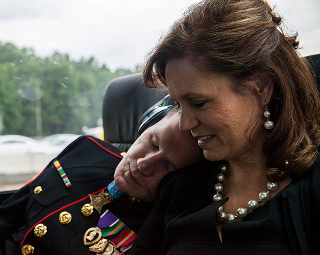 A picture of Medal of Honor recipient Kyle Carpenter with his mother. After everything he’s been through, he’s still her little boy.