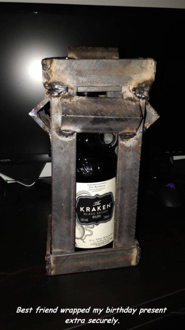 bottle present metal - Kraken Black Spice Rum 40%vol Best friend wrapped my birthday present extra securely.