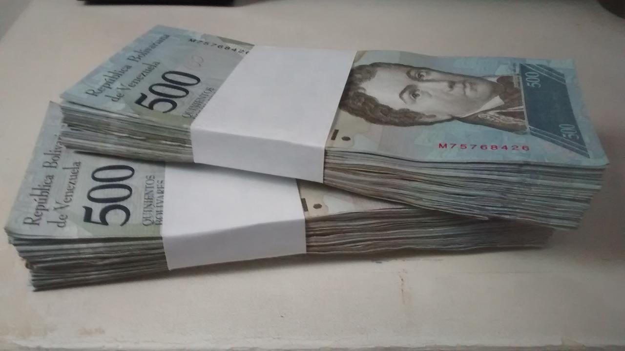 This is what 80 cents (US) looks like in Venezuelan currency.  At the moment, one dollar is worth $127,000 bolívares
