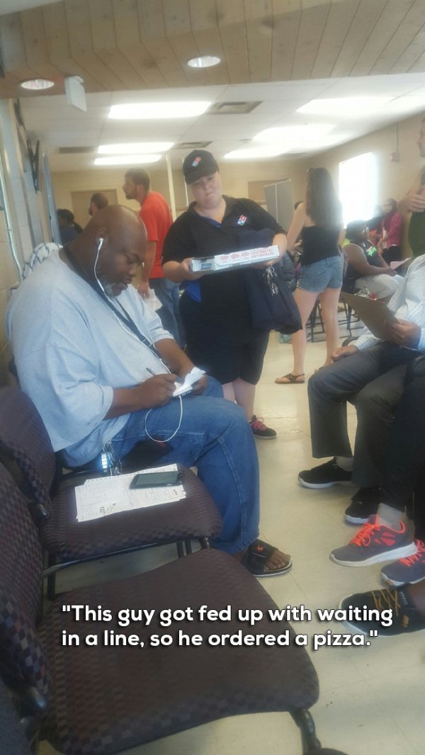 guy orders pizza at dmv - S "This guy got fed up with waiting in a line, so he ordered a pizza."