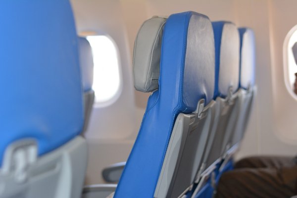 “I was once on an overnight flight from Ottawa to Frankfurt that was only half full. I sat on one end of the aisle seat while another woman sat on the aisle seat on the other side with two empty seats between us. Instead of each of us splitting the two empty seats, she put the table down on the seat next to me and put her disgustingly-smelly, shoe-less feet up on it.”