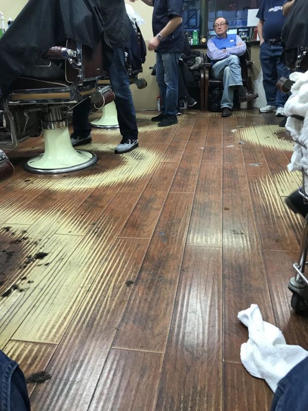 This barbershop floor has faded in nearly perfect circles.