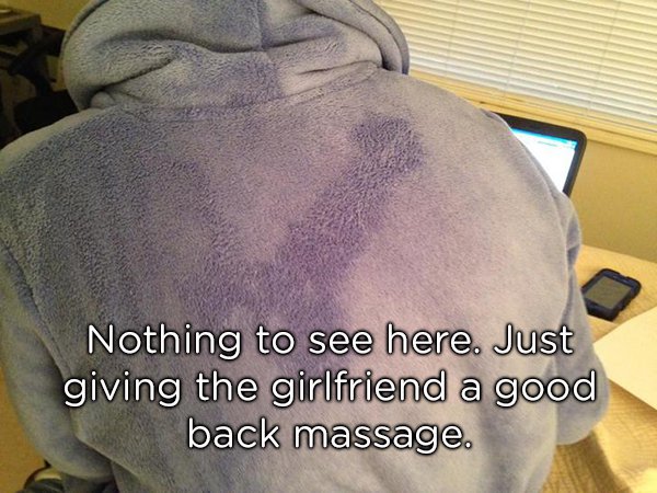 photo caption - Nothing to see here. Just giving the girlfriend a good back massage.