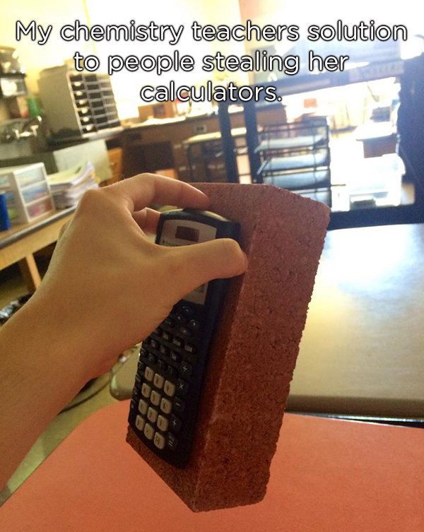 calculator glued to brick - My chemistry teachers solution to people stealing her calculators.
