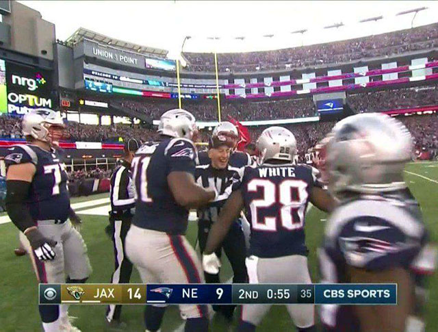 The ref looks REALLY happy that the Patriots scored a touchdown