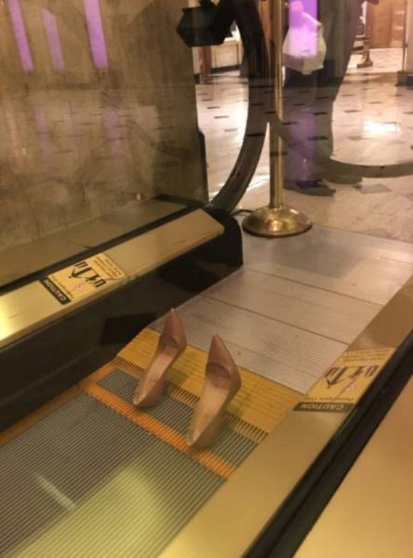 heels stuck in escalator