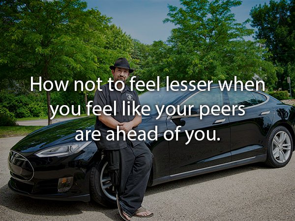 man in tesla car - How not to feel lesser when you feel your peers are ahead of you.