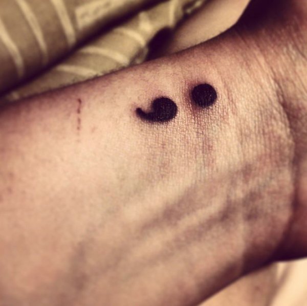 “My Second Tattoo Nearly Two Weeks After My First. A Semicolon For Suicide Awareness. It May Be Small, But It Has A Powerful Meaning.”