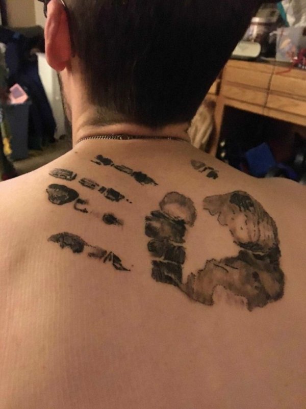 “Got My Dads Last Handprint Tattooed On My Back. My Dad Passed Away Last November And I Had The Funeral Home Take His Handprint For Me And I Got It Tattooed On My Back.”