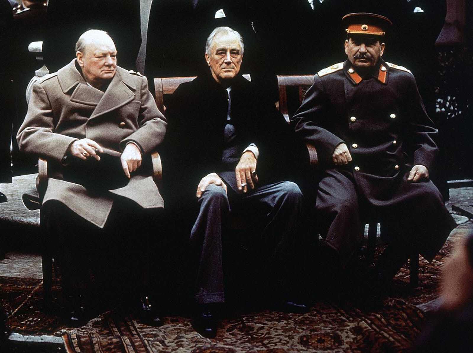 From left, British Prime Minister Winston Churchill, U.S. President Franklin Roosevelt and Soviet Premier Josef Stalin sit on the patio of Livadia Palace, Yalta, Crimea, in this February 4, 1945 photo. The three leaders were meeting to discuss the post-war reorganization of Europe, and the fate of post-war Germany.
