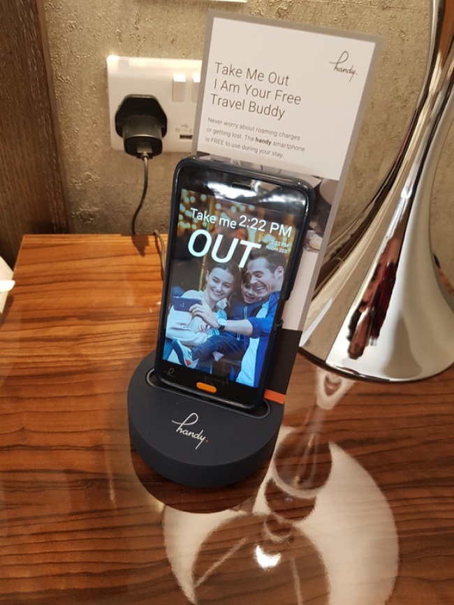 This hotel room that comes with a complimentary Android phone with free data and call service.