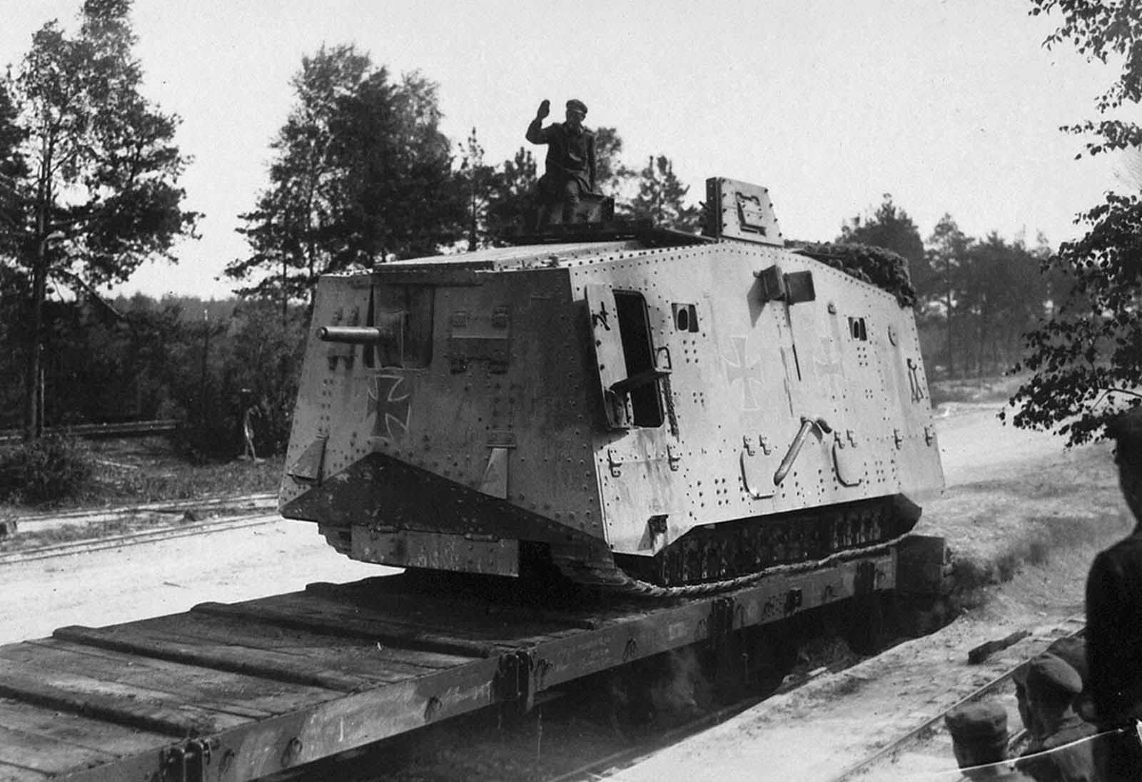 Western front, loading a German A7V tank onto a railroad flat car. Fewer than a hundred A7Vs were ever produced, the only tanks manufactured by Germany that they used in the war. German troops did manage to capture and make use of a number of allied tanks, however.