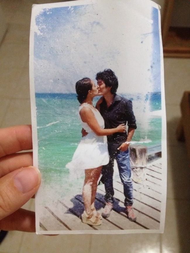 “I found this picture floating in the ocean while snorkeling.”