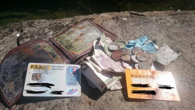 “So my dad, a fisherman at Lake Attersee, Austria, just fished up his old, lost wallet in one of his fishnets after he dropped it in the lake 20 YEARS AGO.”