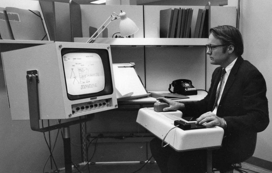 The first public demonstration of a computer mouse, graphical user interface, windowed computing, hypertext and word processing, (1968).