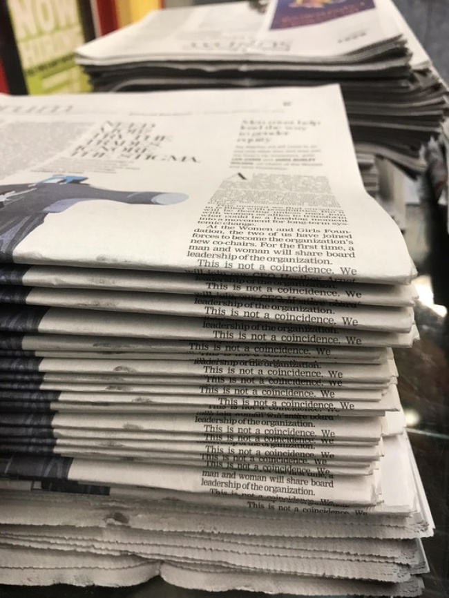 These newspapers that were stacked in a weird way.