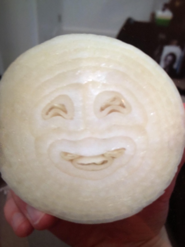 An onion with a smiley face.