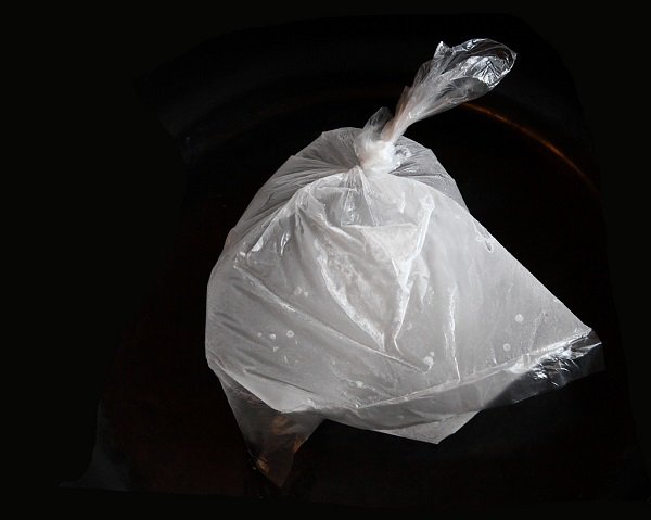Water Bags.

Simple, unassuming, and deadly. A grocery bag can weight anywhere from 20-40 lbs when filled with water. Having that dropped on someone from above can cause some real damage. An instance of this in 2011 saw a man hospitalized with serious injuries.