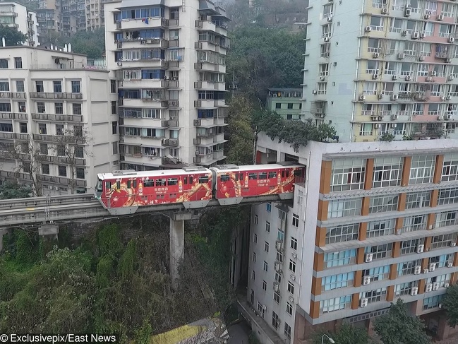 A train that goes through an occupied house in Chongqing, China.