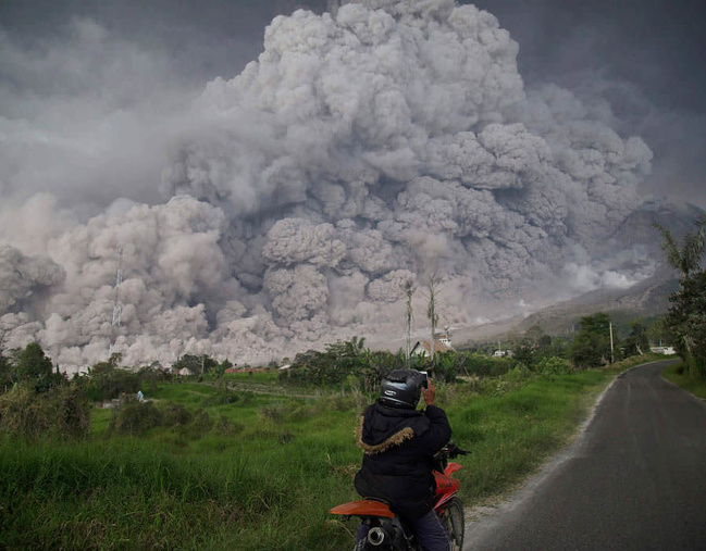 Ash streams during the eruption of Mount Sinabung in Indonesia.