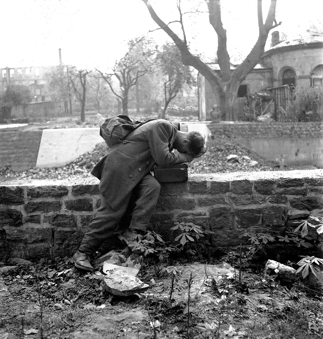 A German soldier held prisoner returns to his home only to find rubble, 1947.