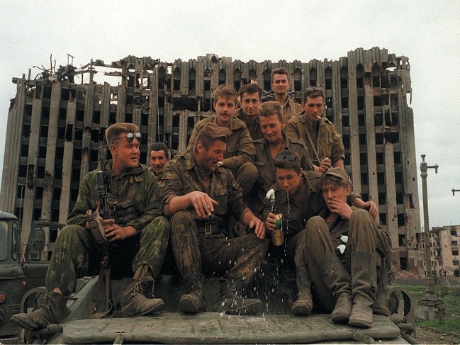 Russian soldiers celebrating during the First Chechen War, 1995.