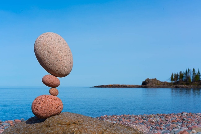 “After eight hours of balancing stones on the beaches of Lake Superior yesterday, I was exhausted. Then I saw this big white rock, got re-inspired, and created one more piece, the favorite of the day.”