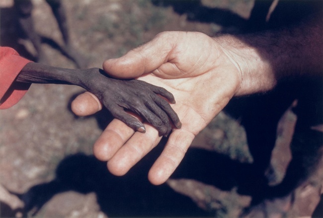 This picture shows us the hand of a Ugandan boy held by a missionary. It’s a sad reminder about the disparity in this world.