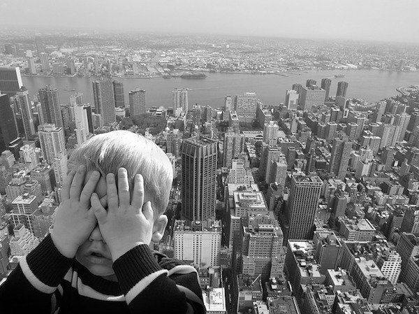 Why we’re afraid of heights.
Other than common sense, it’s a physiological reaction. When you’re up high, your inner ear feels a different pull of gravity and tells your senses that the distance between you and the ground has changed. If the distance is higher than 30 feet (3 stories), the body goes into panic mode as your eyes confirm the same thing your inner ear does.

What’s remarkable, is that we’re not born with this fear. Babies aren’t afraid of heights at first. It’s only after they learn to crawl, scoot then walk, that they learn that falling from a height, hurts. It’s the growing sense of space and movement that causes this fear to develop.