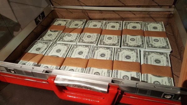 Josh Ferrin from Utah was in his workshop when he noticed something sticking out of the ceiling. He pulled on it, and an access panel to the attic popped open. He saw a metal container, opened the lid, and found several rolls of money tied up in twine.

As he kept looking, he found another 7 boxes plus 2 big black trash bags full of cash. It was a total of about $45,000.

Josh called the previous owners of the house and told him about what he found. The previous owners had no idea since they inherited the house and said it must have been their dad who had hidden the money.