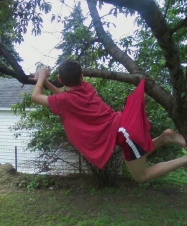 “In 2011 I got stuck in a tree. Instead of helping me, my mom took this picture.”