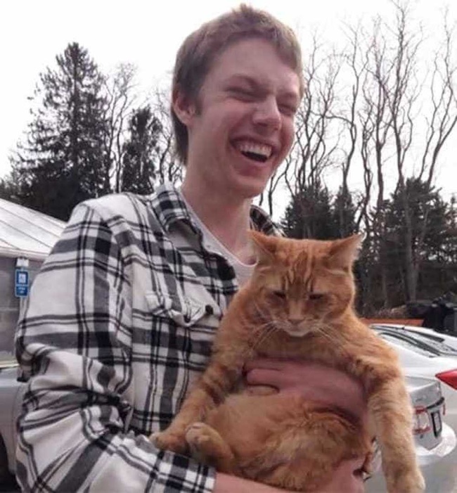 “My blind friend’s first time holding a cat”.