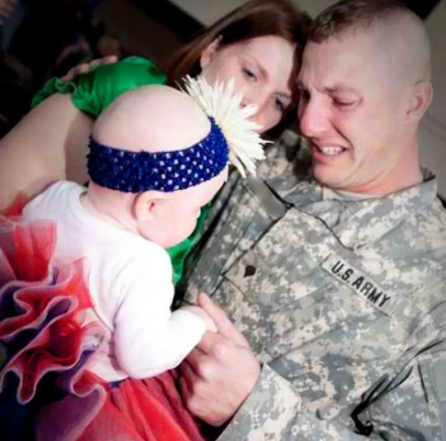 A previously deployed soldier meets his daughter for the first time.