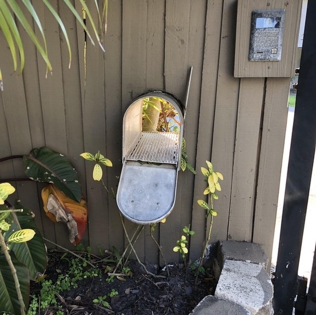 This mailbox that opens on both sides so the homeowner doesn’t have to open his gate