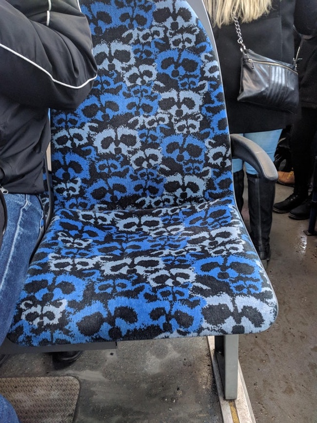 These bus seats with a raccoon pattern in Tampere, Finland