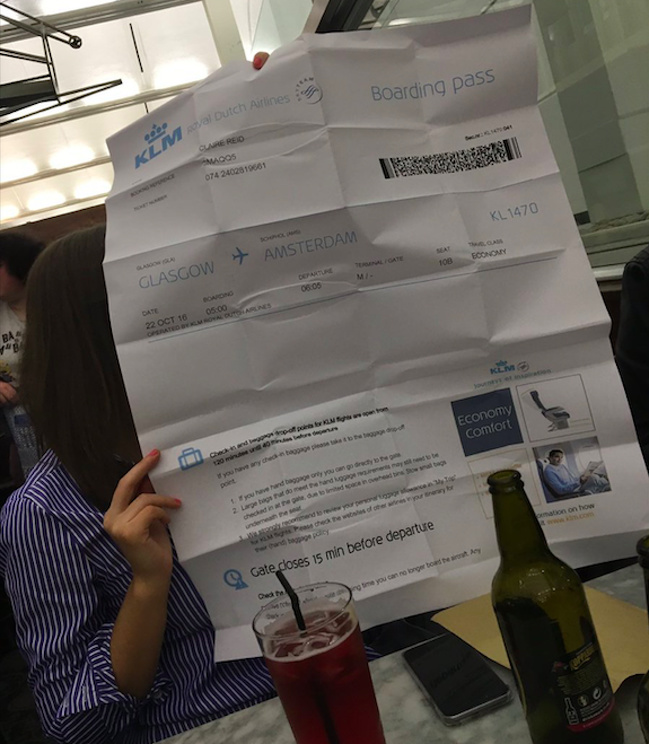 “Hannah printed Claire’s boarding pass out on poster sized paper.”