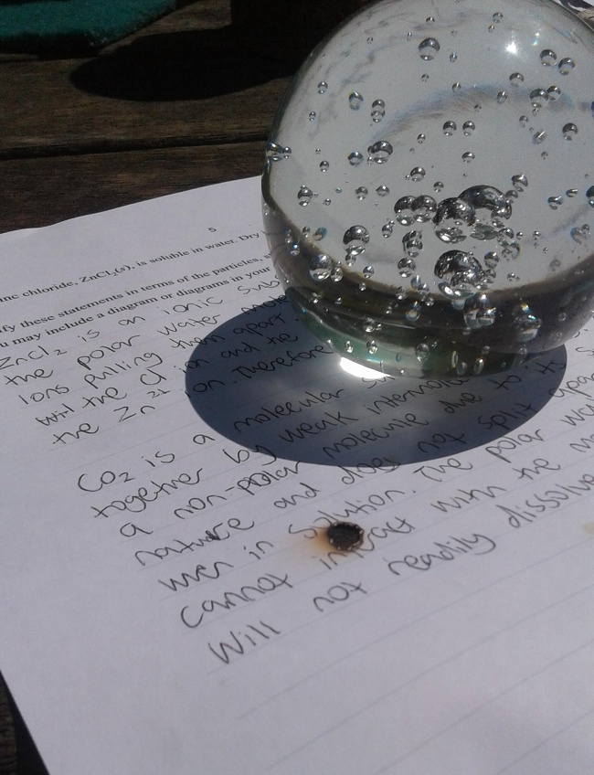 “My crystal ball paper weight burnt a hole in my homework.”
