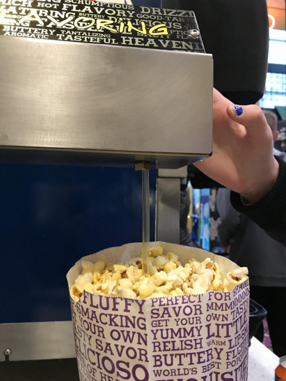 Tired of movie theater butter only sitting atop the top layer of popcorn? Use a straw to really get that butter in there.