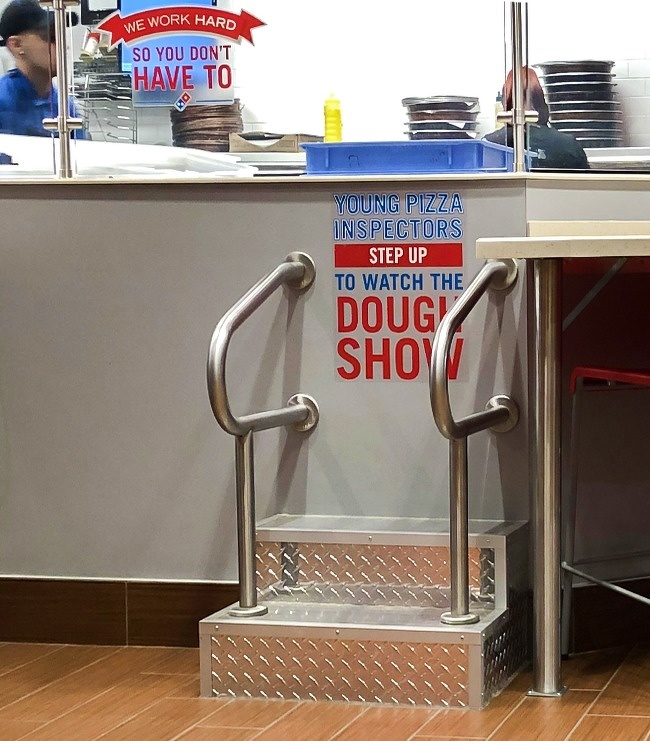 This pizza restaurant installed a small ladder, so children can watch how pizza is made.