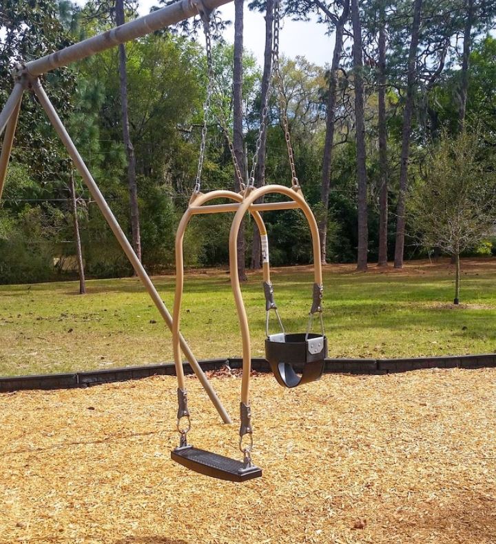 A swing for both a parent and a child.