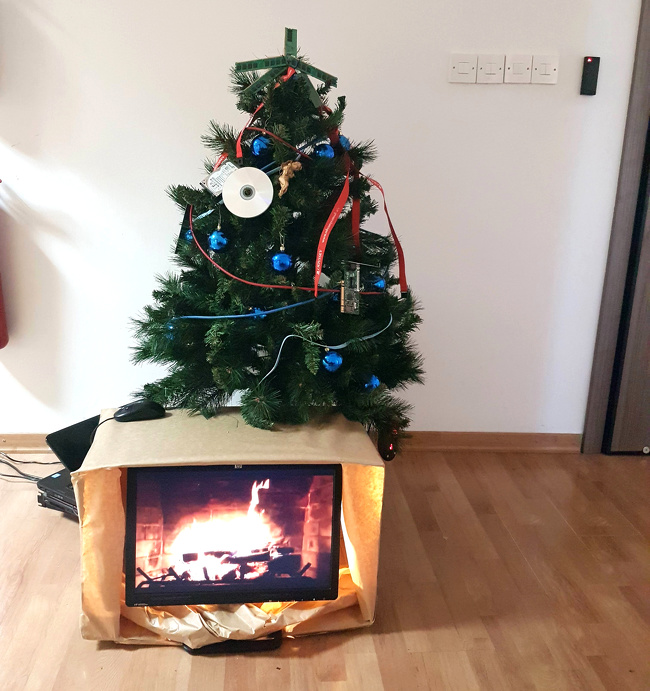 Don’t feel the Christmas spirit? Just install a monitor with a burning fireplace!