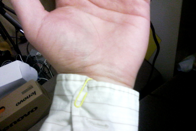 If a button on your sleeve comes off, use a paperclip.